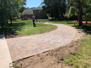 paver pathway connecting to garage