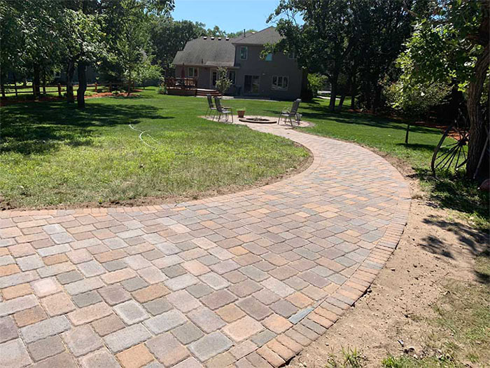 Curved landscaped brick path