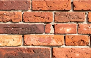 Close-up of brick retaining wall.